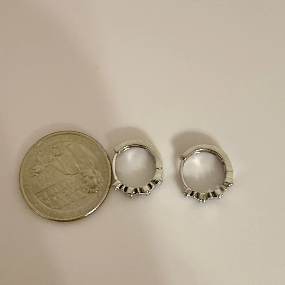 Elegant Silver Cut-Out Cubic Zirconia women’s Hoop Earrings